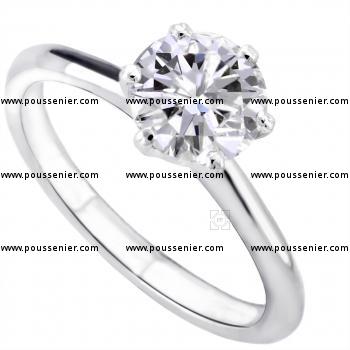 solitaire ring with a brilliant cut diamond set in 6 prongs tiffany setting