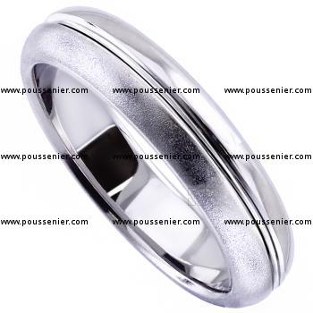 half rounded wedding ring with a deeper engraved line in the middle