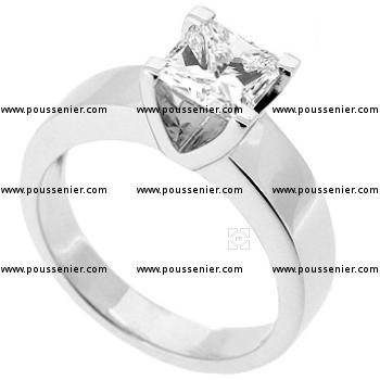 solitaire ring with a princess cut diamond set in 4 thicker prongs