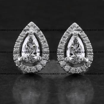 entourage earrings with central pear cut diamonds 0.3ct VS2 D EX/VG GIA 1453783954 & 7451821878 with some space in between surrounded with castle set brilliant cut diamonds