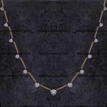 thinner rolo chain with thirteen brilliant cut diamonds set in handmade chatons with three prongs at a distance of a centimeter and an extra ring at two cm 