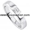 slim solitaire ring with a princess cut diamond under which a small join