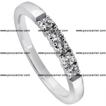 wedding ring set with brilliant cut diamonds set with four prongs per diamond