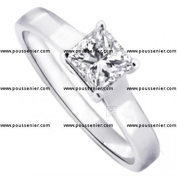solitaire ring with a princess cut diamond set in 4 crossed prongs
