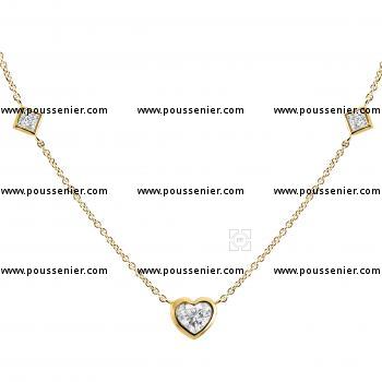 fine anchor chain with a central heart cut diamond and princess cut diamonds in a bezel setting
